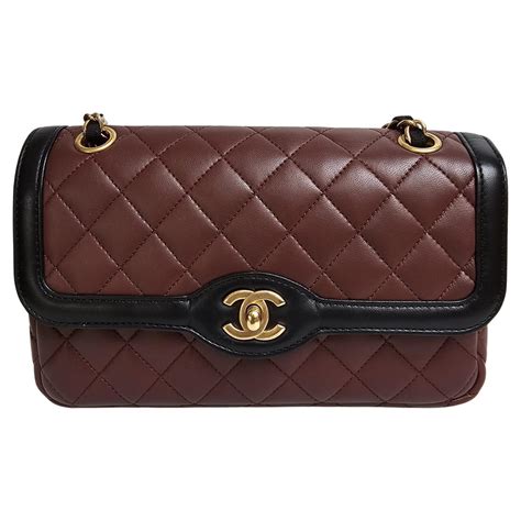 chanel two tone burgundy black lambskin bag runway